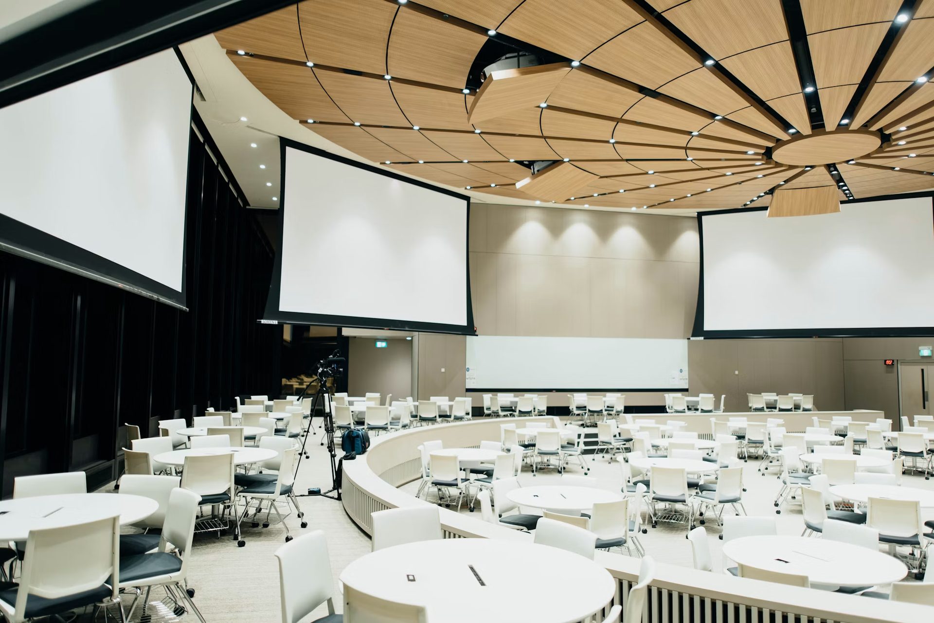A conference hall set for a large corporate gathering